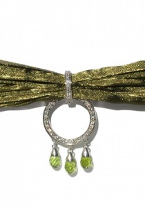 Calgaro Peridot, Diamond Green Silk & Silver Enhancer | Oster Jewelers Blog