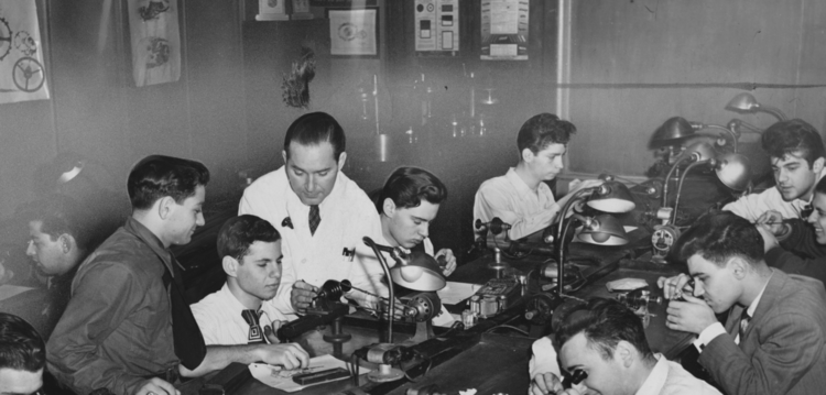 Watchmaking 101 in the 1950s: Horological Society of New York past president Henry B. Fried instructing students on lathe work. Photo credit: The Brooklyn Public Library — Brooklyn Collection]