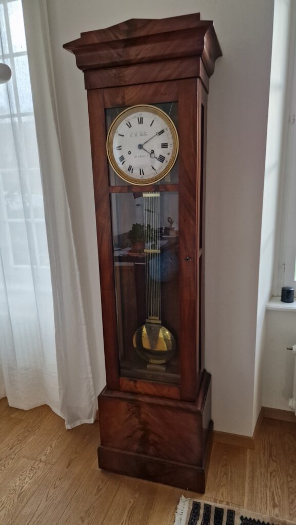 An antique grandfather clock restored by Bernhard Lederer