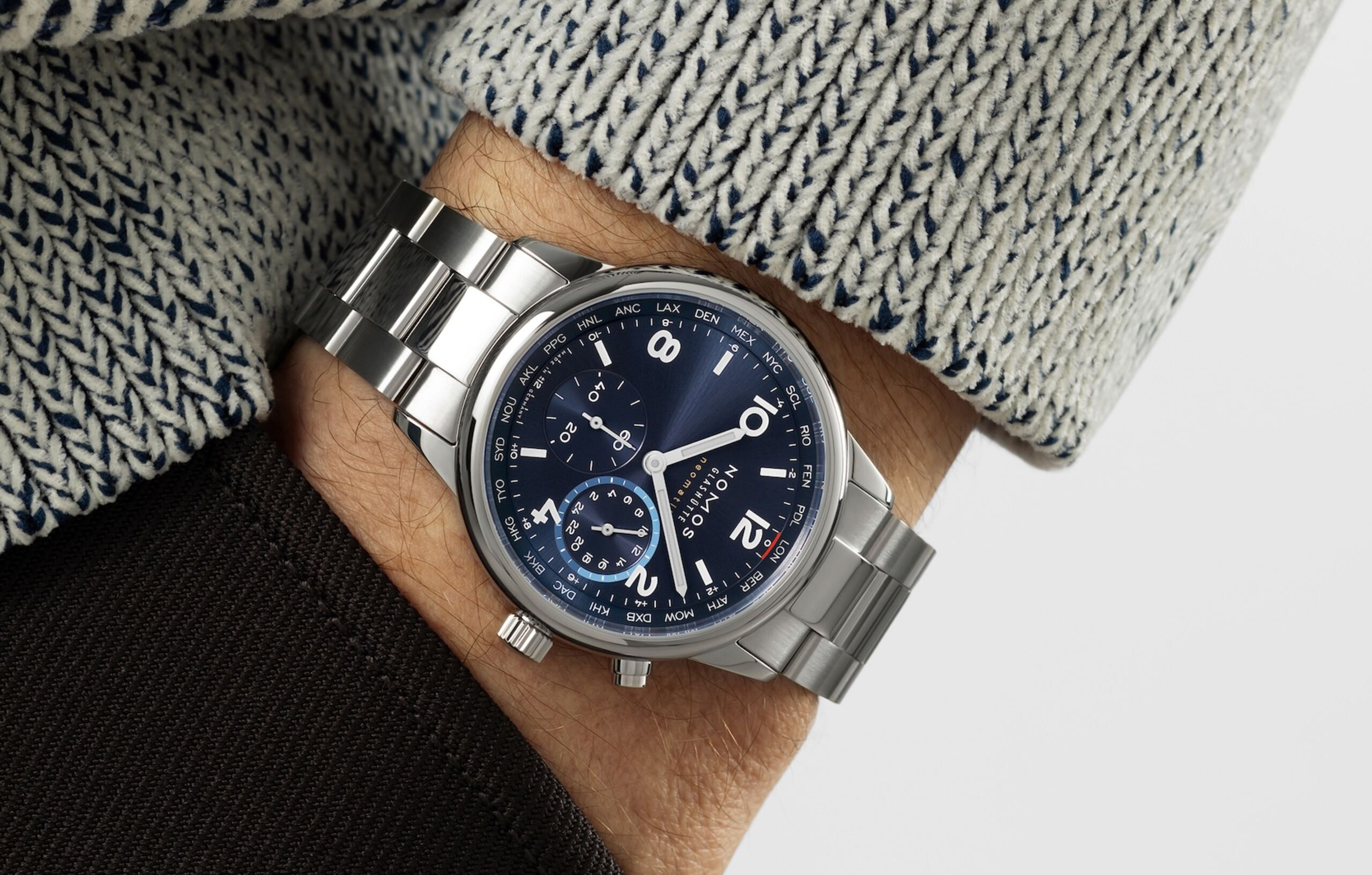 NOMOS Club Sport Neomatik Worldtimer Blue on the wrist