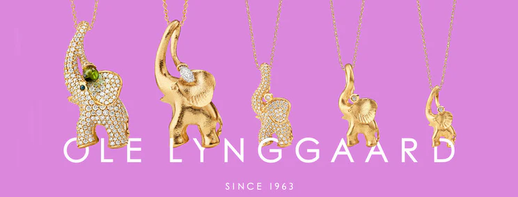 Ole Lynggaard Copenhagen Elephant Collection on Pink background