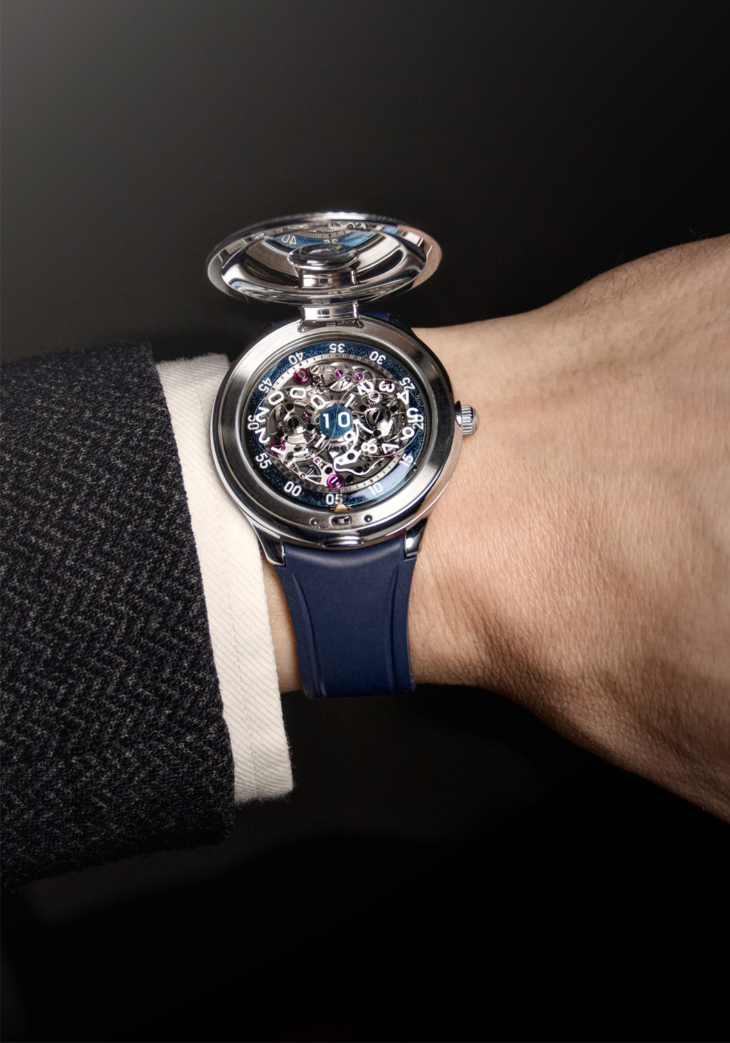 Czapek The Time Jumper Stainless Steel shown flipped open on a man's wrist