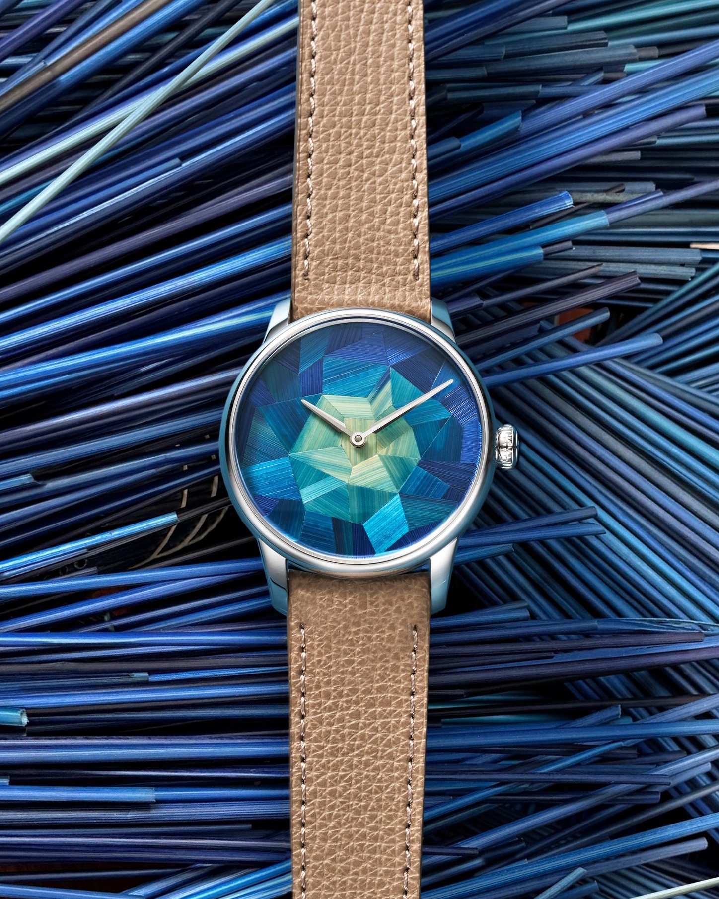 Louis Erard Marqueterie de Paille on a blue straw background