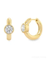 Spotlight meets subtle sparkle—Ruchi's Scintillate Solitaire Round Diamond Hoops in 18K yellow gold are the modern answer to everyday luxury. Each earring holds a single round brilliant diamond, catching the light with every move. Understated, yet unforgettable. Perfect for dressing up denim or adding polish to a silk wrap dress.⁠
⁠