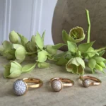 Grace in full bloom. 🌸 The Ole Lynggaard pavé diamond Lotus rings capture the quiet power of nature with a delicate, hand-sculpted twig like 18K gold band nestled with a dome of pavé diamonds. Stack them in layers of light, or wear one as a subtle spark of beauty—each ring is a tribute to the lotus flower’s timeless symbolism of resilience, renewal, and inner calm.⁠
⁠