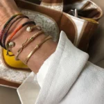 Sun on your skin, salt in the air, and golden details that tie it all together. 🌞🌊 The Life Rope bracelets and Nature cuffs by Ole Lynggaard Copenhagen are summer essentials: playful, stackable, and endlessly versatile. Designed to move with you from beach days to balmy nights, these pieces bring a touch of Scandinavian luxury to every summer moment.⁠
⁠
Mix vibrant braided rope with sculpted gold textures to create your own rhythm, whether you're barefoot in the sand or sipping cocktails under the stars.