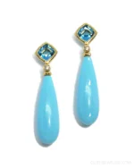 A splash of sea and sky in every sway. 🌊💎⁠
⁠
These 18K yellow gold dangle earrings pair vibrant turquoise with glowing Swiss blue topaz, capturing the cool, crystalline hues of ocean waters. Light-catching and full of movement, they bring vacation energy to every outfit, whether you're poolside in a kaftan or dressed up for a rooftop evening.⁠
⁠
Perfect for summer, unforgettable year-round. Dive into color at Oster Jewelers.⁠
⁠